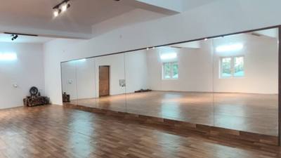The Nartanam studio hall — sprung wooden floor and mirrored wall